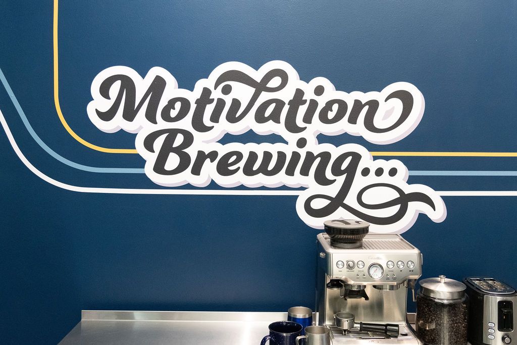 Motivation Brewing mural above the Fusion coffee bar
